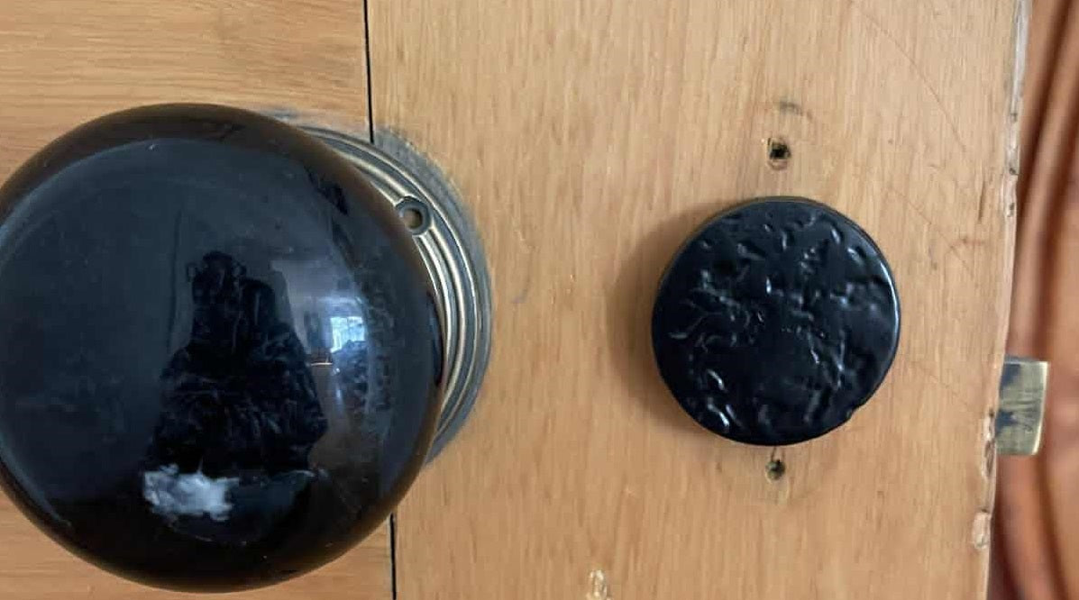CAST IRON ROUND COVERED DOOR ESCUTCHEON